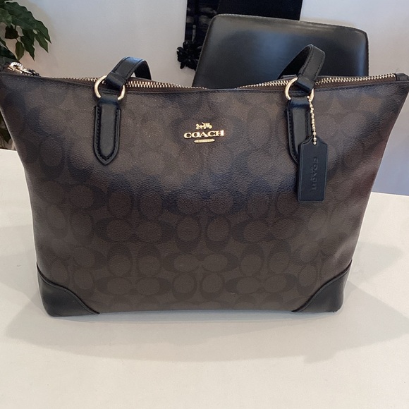 Coach Handbags - Coach Brown/Black Signature Canvas Tote with Gold Hardware